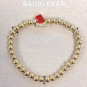 Brand New BaubleBar Gold Tone Beaded Bracelet w/ Rhinestone Red Santa Hat Charm